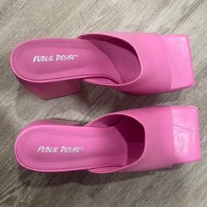 Pink open toe chunky heel mules